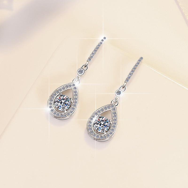 Damen Tropfenohrringe mit funkelnden Zirkoniasteinen und eleganter Fassung Shop Nory