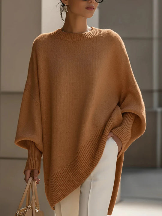 Damen nan Oversize Strickponcho mit asymmetrischem Saum und gerippten Ärmeln Shop Nory