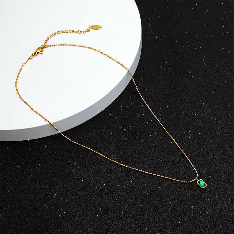Damen eleganter Halsschmuck mit grünem Edelstein Shop Nory