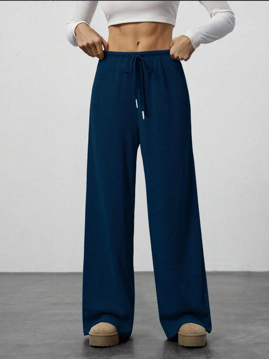 Damen Weit geschnittene Relax-Hose aus elastischem Strickmaterial mit Kordelzug