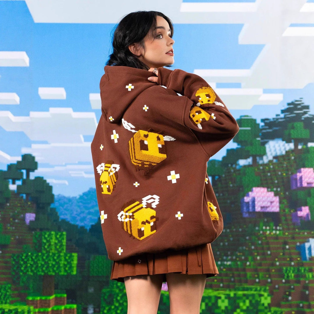 Unisex nan Kapuzenpullover mit eingestricktem Pixel-Bienenmotiv und aufgesetzter Kängurutasche