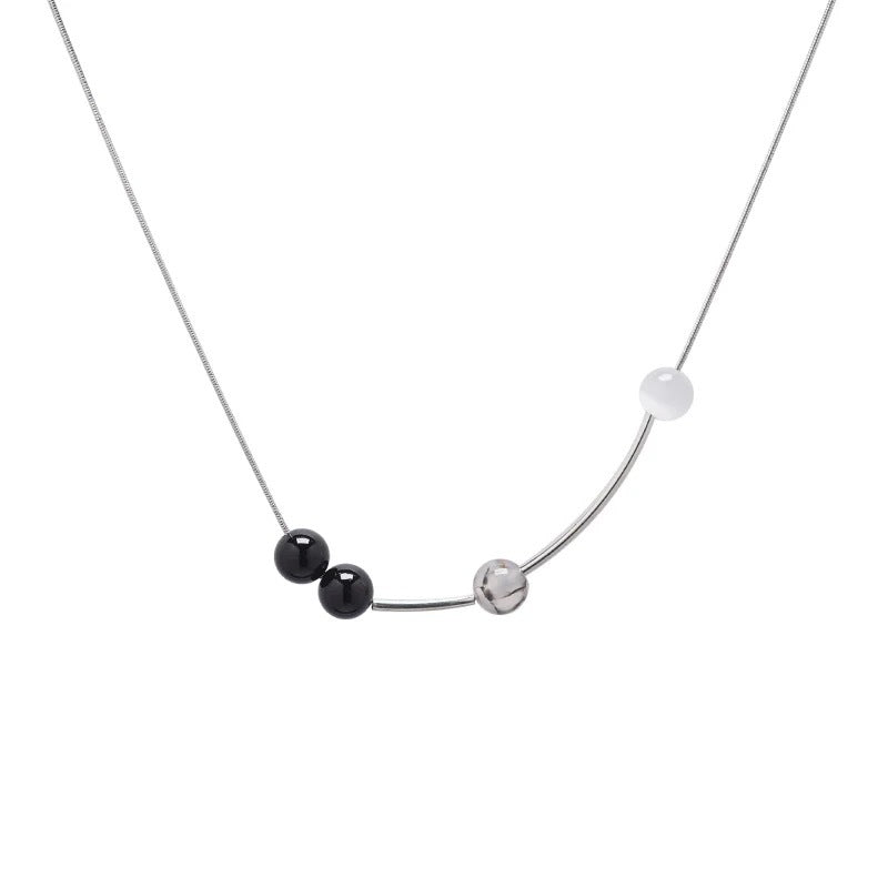 Damen Halskette mit kunstvollen Glasperlen und modernem Designelement Shop Nory