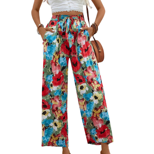 Damen Leichte High‑Waist Marlenehose mit floralem Aquarellprint, weitem Bein & Bindegürtel Shop Nory