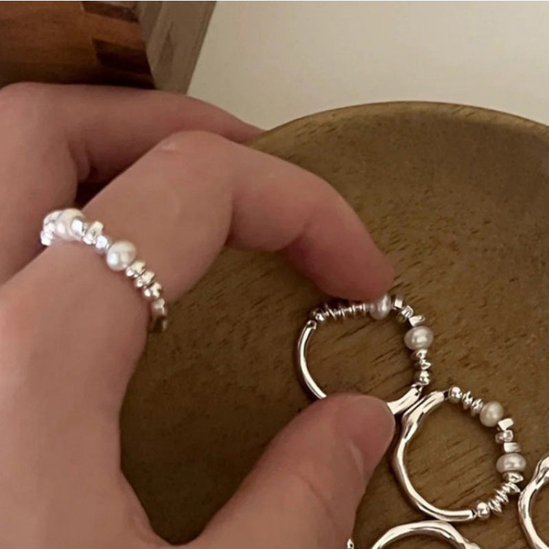Damen Ring mit kunstvollem Design und edlen Perlenakzenten Shop Nory