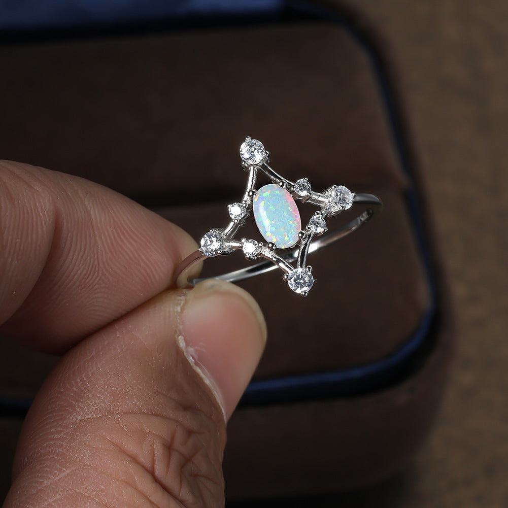 Damen Ring mit funkelnden Zirkonia und schimmerndem Opal-Motiv Shop Nory