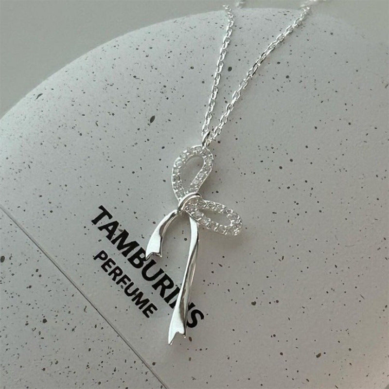 Damen Halskette mit elegantem Schleifenanhänger Shop Nory