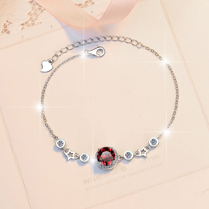 Damenarmband mit strahlendem Kristall und funkelnden Sternen Shop Nory