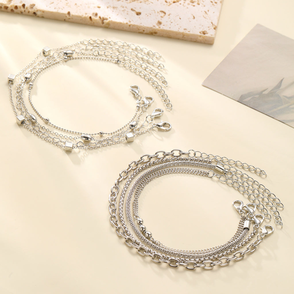 Damen Armband-Set mit feinen, geschmackvollen Ketten und eleganten Anhängern Shop Nory