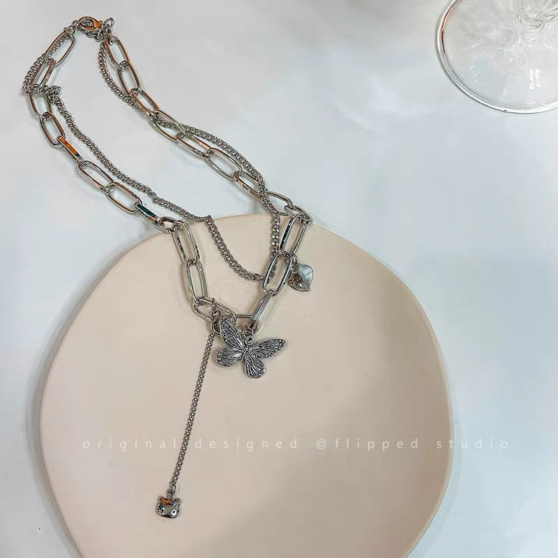 Damen Kette mit kunstvollem Schmetterlings- und Herzanänger Shop Nory