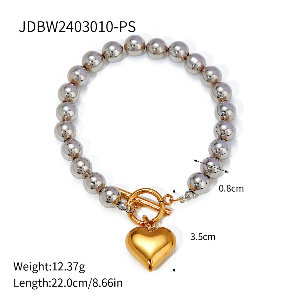Damen Armband mit eleganten Perlen und herzförmigem Anhänger Shop Nory
