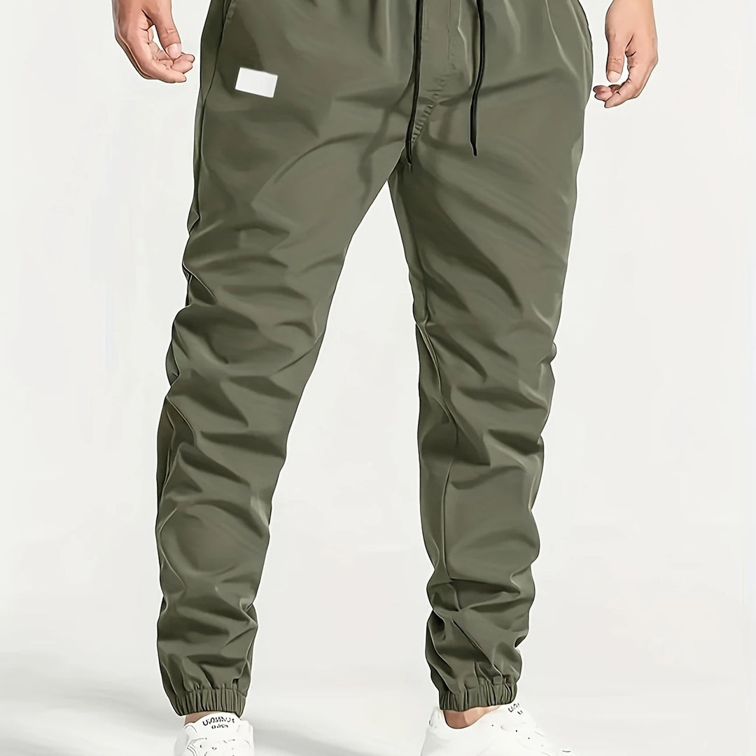 Herren Slim‑Tapered Tech‑Joggerhose mit Tunnelzugbund, elastischen Knöchelbündchen und funktionalen Seitentaschen Shop Nory