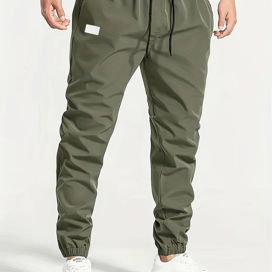 Herren Slim‑Tapered Tech‑Joggerhose mit Tunnelzugbund, elastischen Knöchelbündchen und funktionalen Seitentaschen Shop Nory