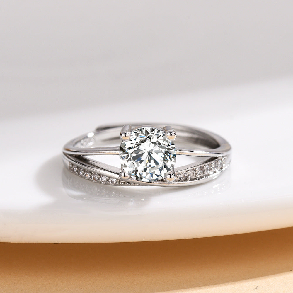 Damen eleganter Solitärring mit geschwungenem Design und funkelndem Zirkonia Shop Nory