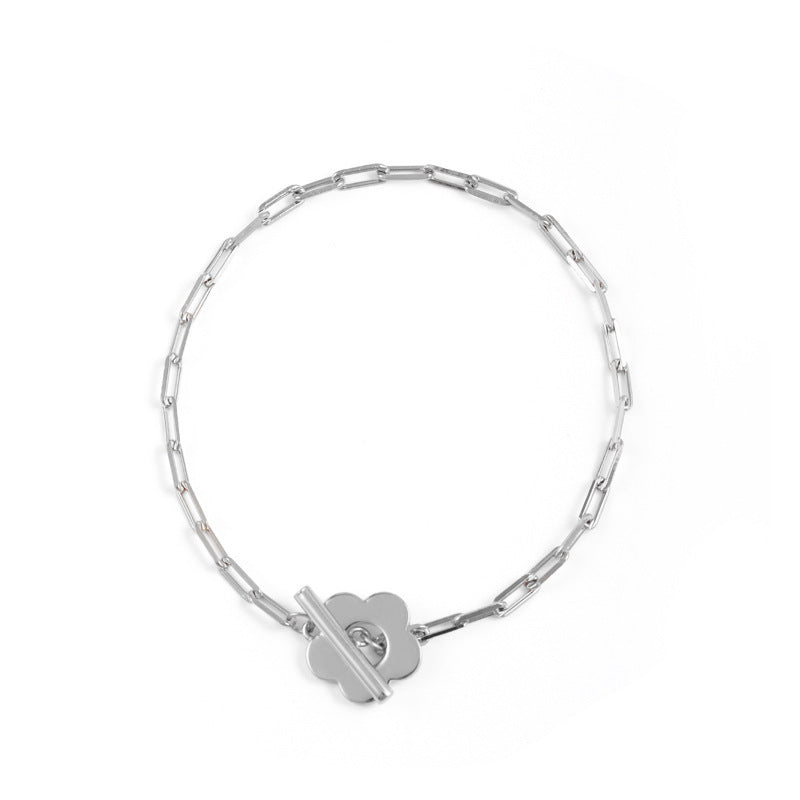 Damen Armband mit floralen Motiven und funkelnden Zirkonia-Elementen Shop Nory