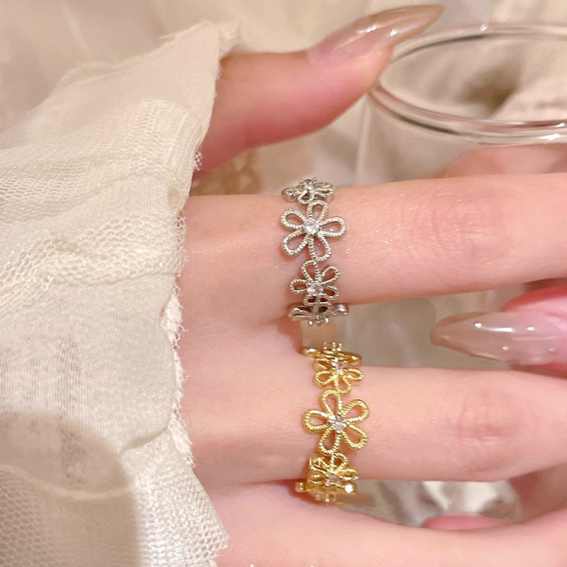Damen Zarter Blumenring mit funkelnden Zirkonia-Steinen Shop Nory