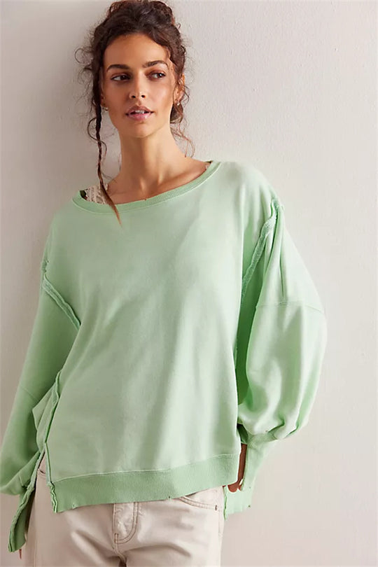 Damen oversized Sweatshirt mit Ballonärmeln, offenen Saumnähten und seitlichen Schlitzen Shop Nory
