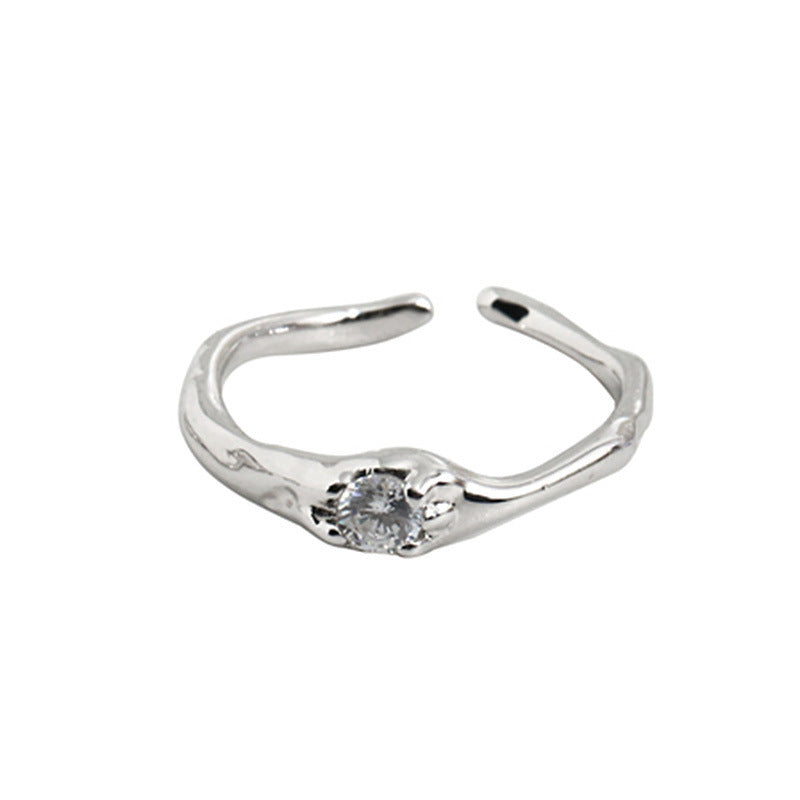 Damen zierlicher und geschwungener Ring mit funkelndem Stein Shop Nory