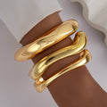 Damen goldenes Armreif-Set Shop Nory