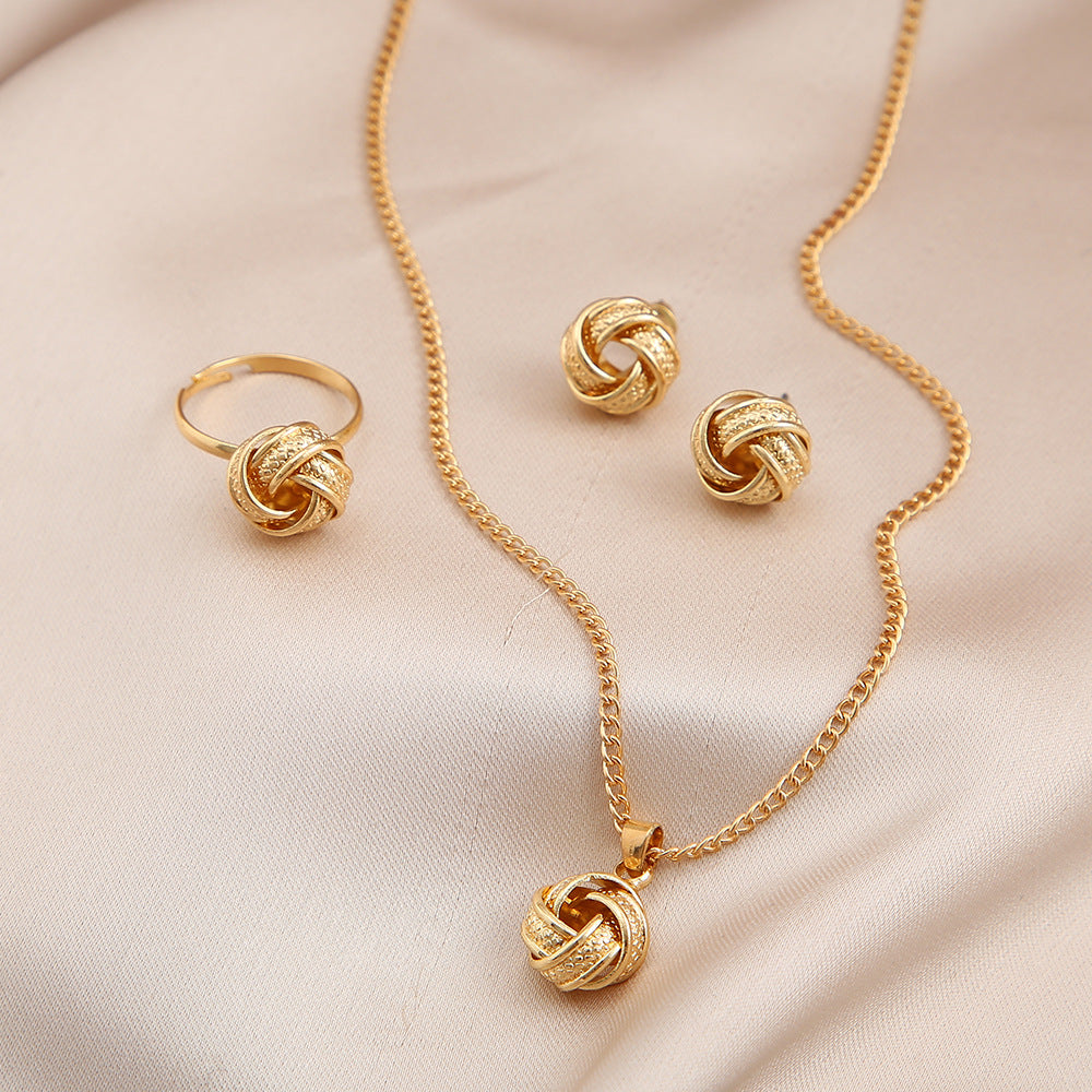 Damen Schmuckset mit kunstvoll gestaltetem Knotenanhänger Shop Nory
