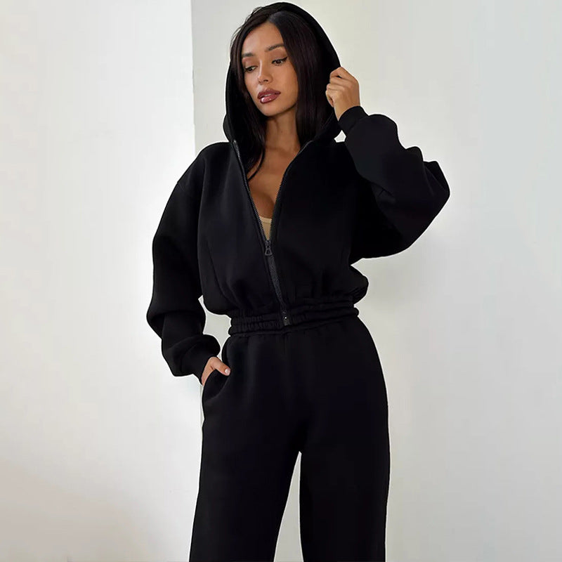 Damen Taillierter Zip-Overall im Loungewear-Stil mit Kapuze, Balloonärmeln und hoher Bundkante Shop Nory
