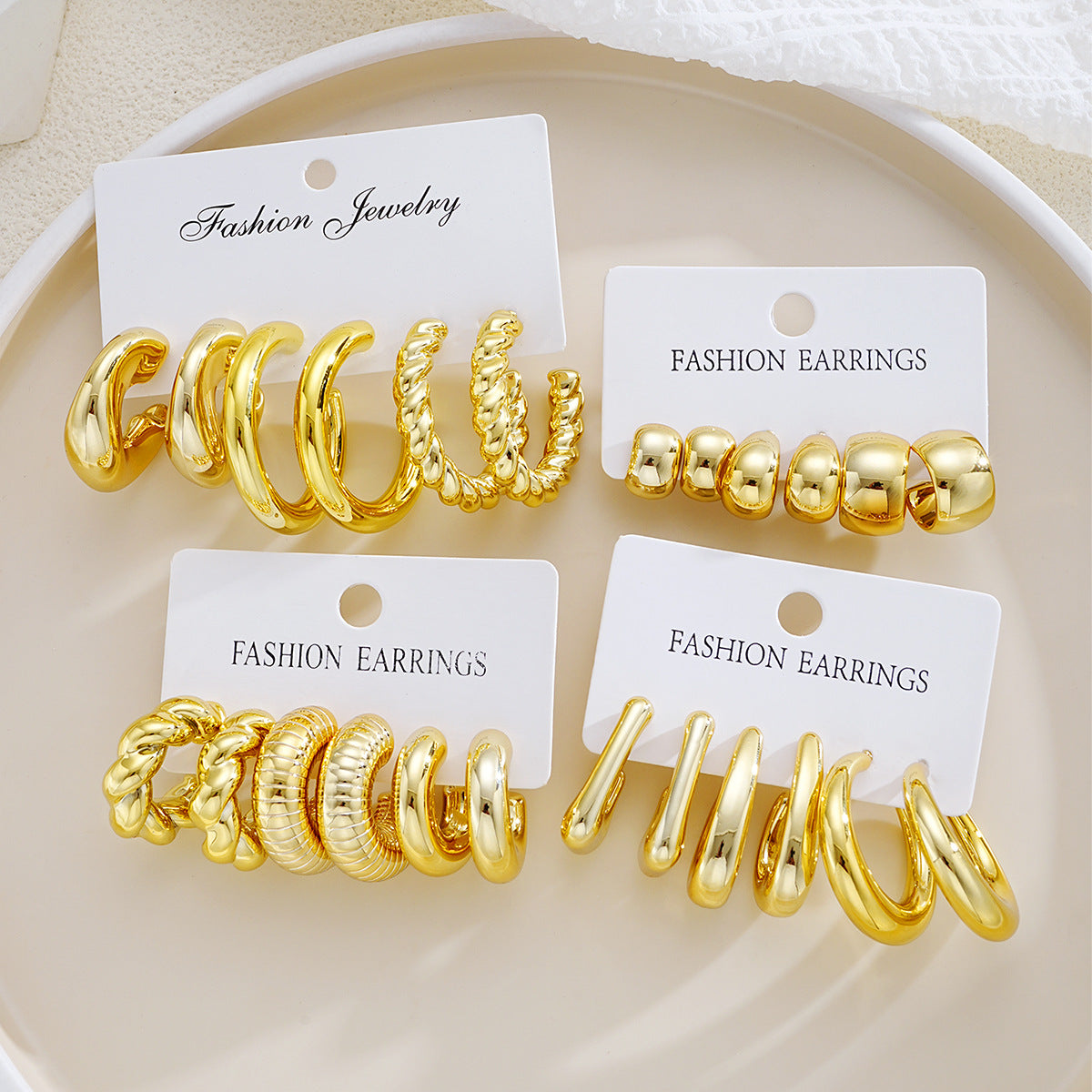 Damen Ohrstecker-Set mit modernen, geschwungenen und strukturierten Designs Shop Nory