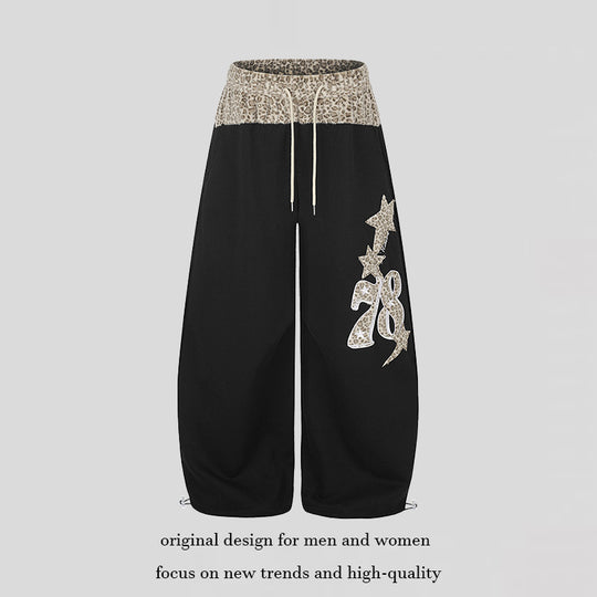 Damen Extraweite Palazzo-Loungehose mit hohem Komfortbund, Leoprint-Bund und dekorativer Stern-Ziffer-Applikation Shop Nory