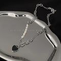 Damen Kette mit Herzanhänger und klassischen Perlendetails Shop Nory