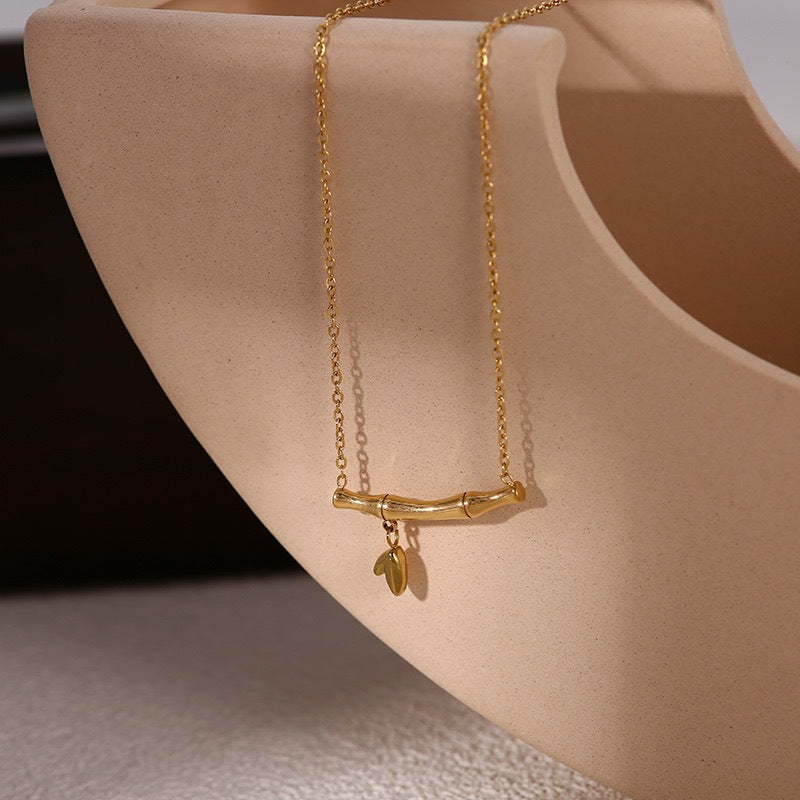 Damen Halskette mit filigranem Zweigdesign und elegantem Anhänger Shop Nory