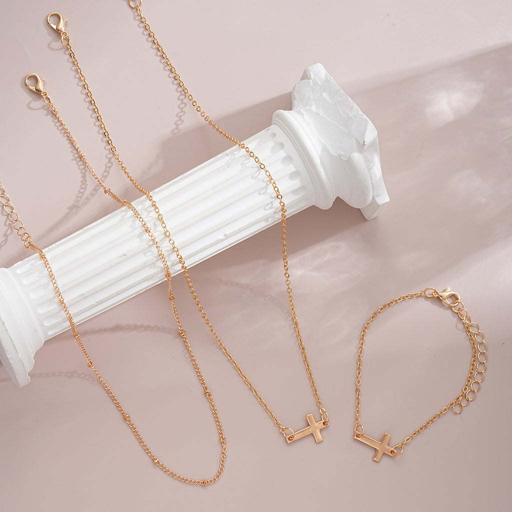 Damen mehrlagige Halskette und Armband-Set mit minimalistischen Kreuzanhängern Shop Nory