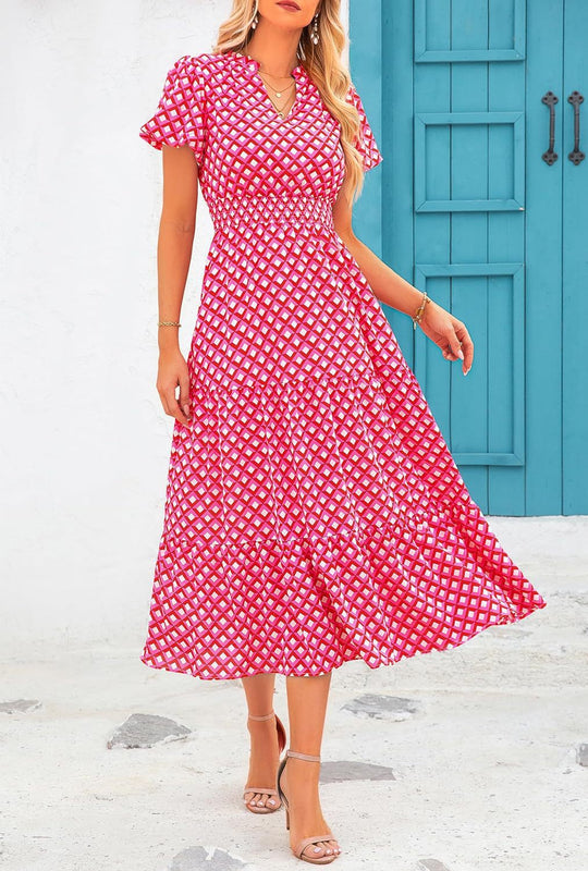 Damen Maxi-Kleid mit floralen Mustern und rüschendem Saum Shopnory