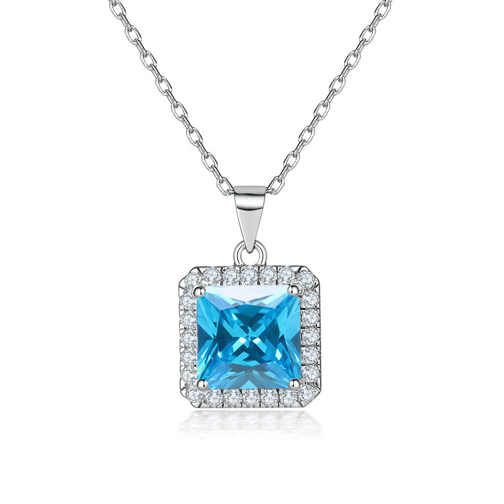 Damen Anhänger mit funkelndem Zirkonia-Rahmen und quadratischem Aquamarin Shop Nory