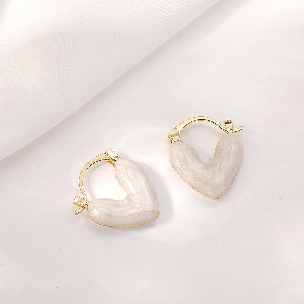 Damen Ohrstecker in Herzform mit elegantem Goldrahmen Shop Nory