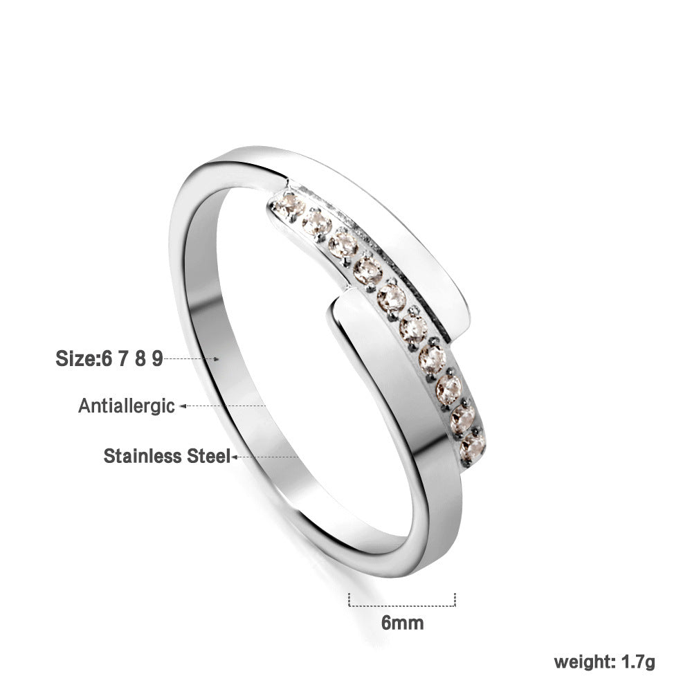Damen Ring mit brillantem Zirkonia und eleganter Edelstahlfassung Shop Nory