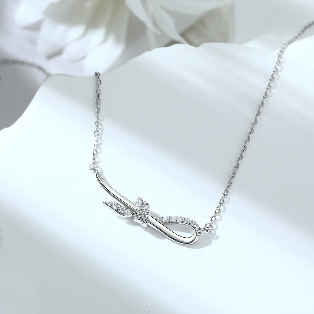 Damen Halskette mit elegantem Schleifenmotiv und funkelnden Zirkonia-Steinen Shop Nory