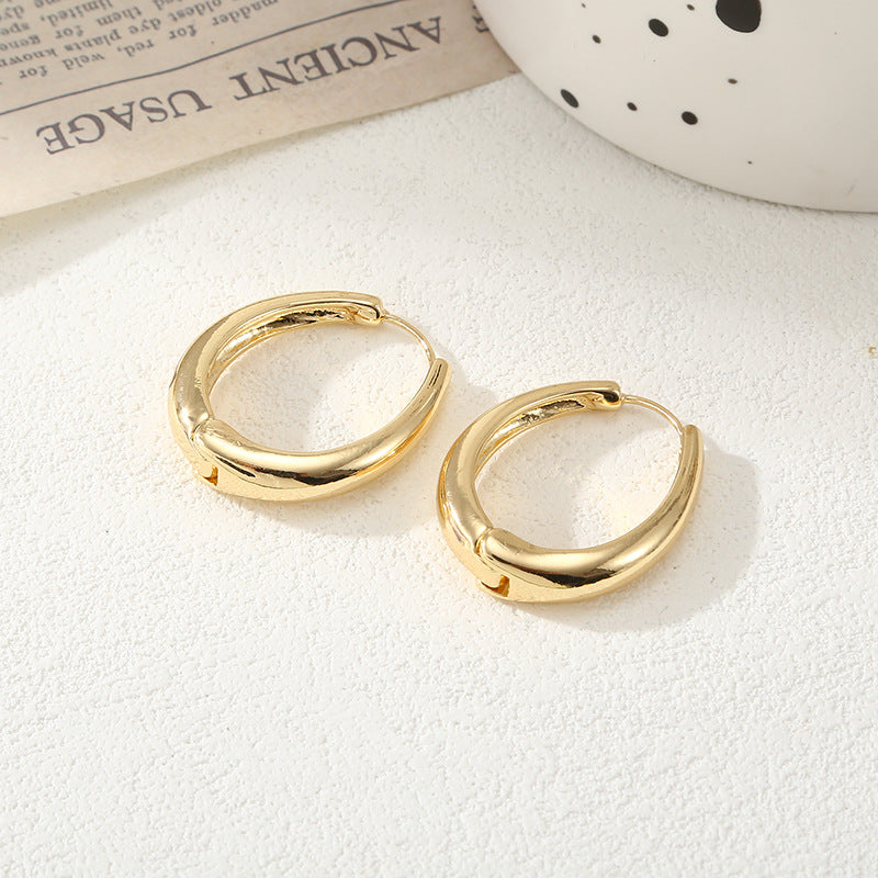Damen Creolen mit elegantem geschwungenen Design Shop Nory