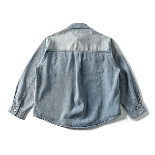 Damen Weite Denim‑Hemdjacke im Oversize‑Cut mit Druckknopfblende, Western‑Brusttaschen und abgerundetem Saum Shop Nory