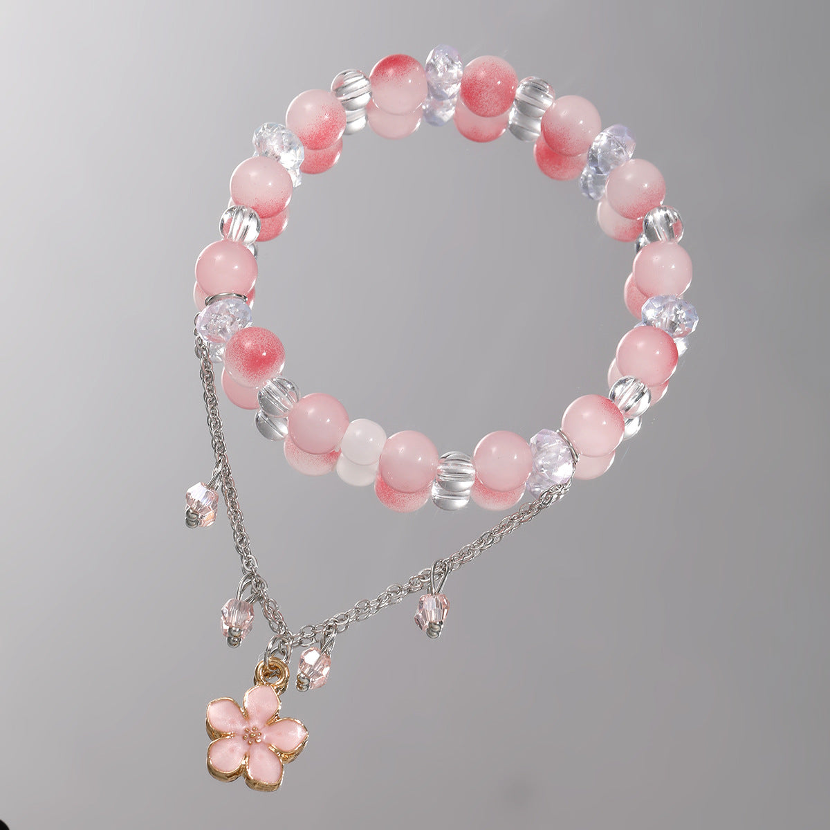 Damenuhr mit funkelnenden Kristallperlen und elegantem Anhänger Shop Nory