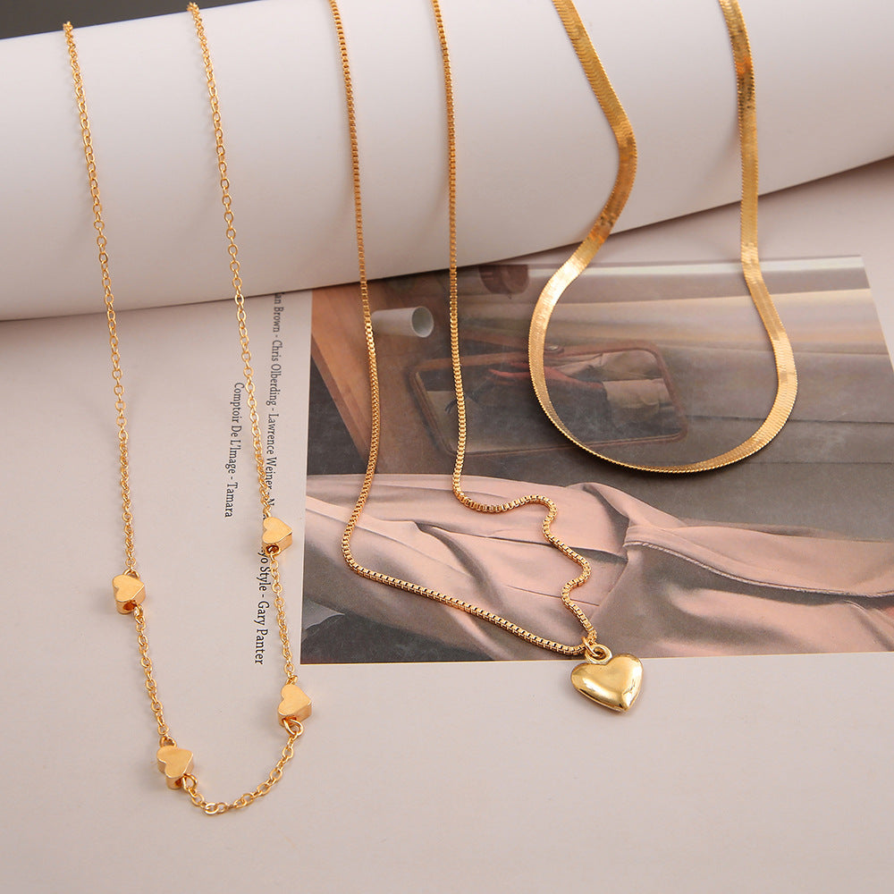 Damen Halsketten-Set mit zarten Herzanhängern und eleganten Gliederketten Shop Nory