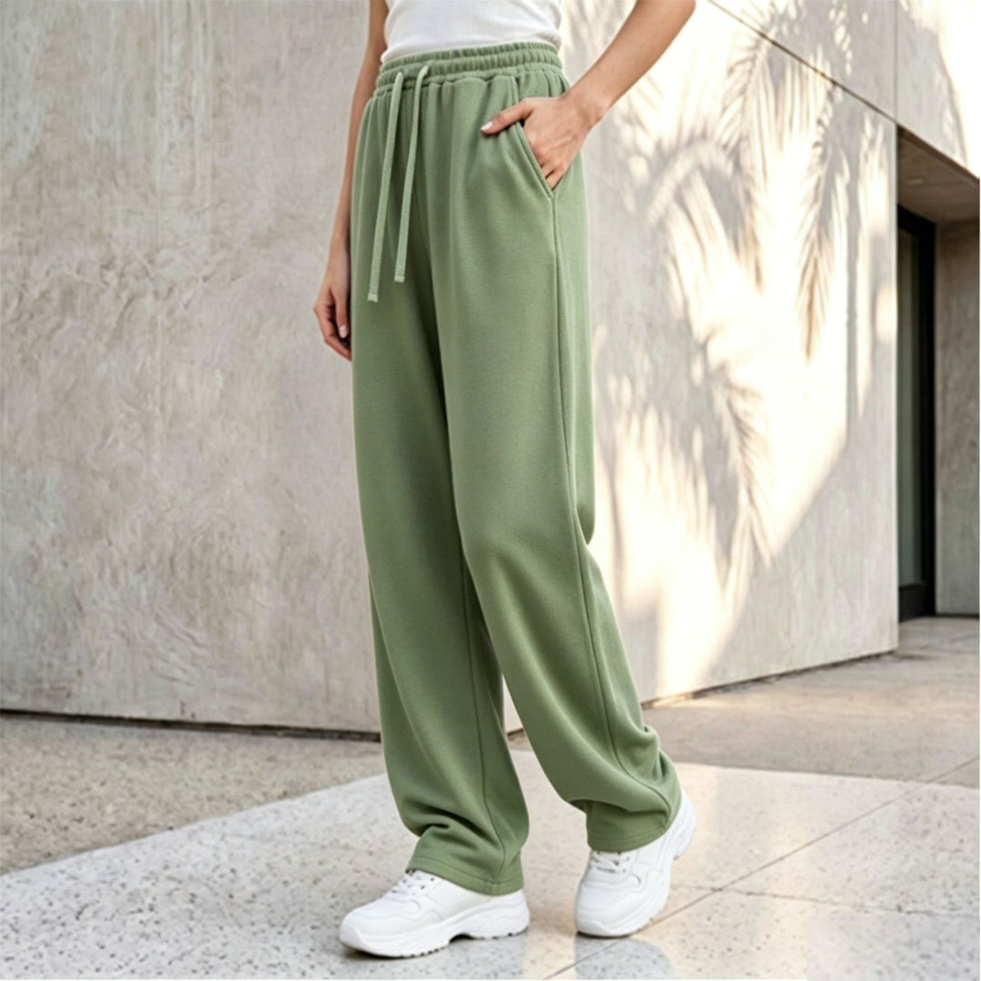Damen nan weite Loungepalazzo-Hose mit hohem Komfortbund, Kordelzug, seitlichen Eingrifftaschen und dekorativer Seitennaht Shop Nory
