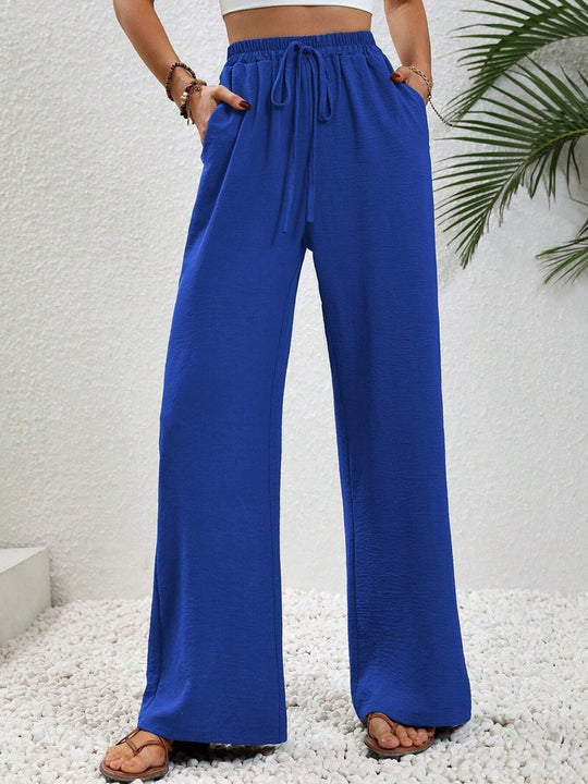 Damen Leichte, weit geschnittene Strandhose mit Elastikbund, Kordelzug und Seitentaschen Shop Nory