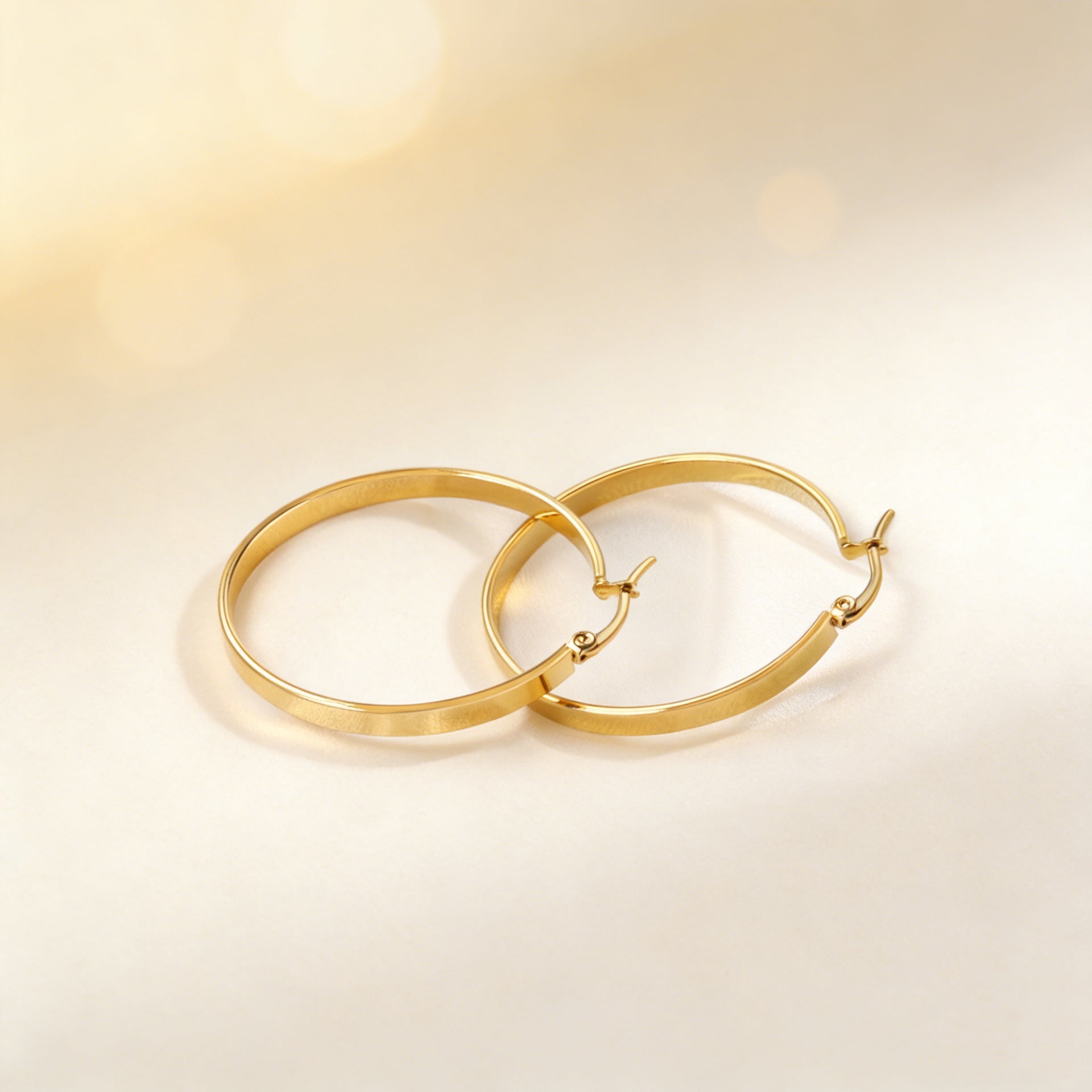 Damen hochwertige Creolen aus Edelstahl mit goldplattierter Oberfläche Shop Nory