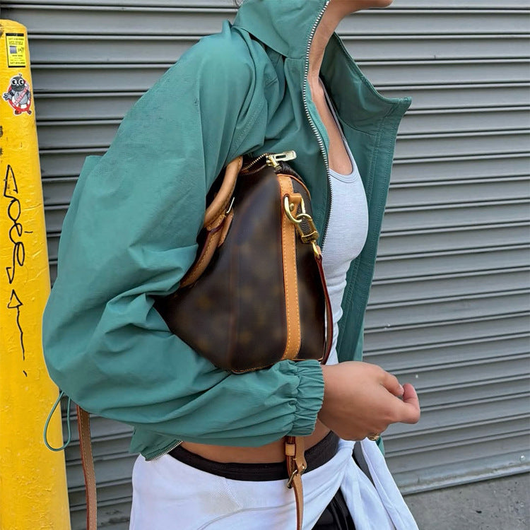 Damen Sportlich-urbaner Windbreaker mit kurzem Cropped-Schnitt, hohem Stehkragen und elastischen Bündchen Shop Nory