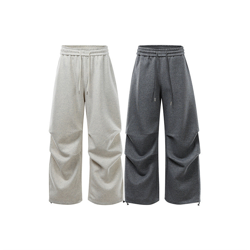 Unisex Weite Sweat-Cargohose mit Ebenenpasse, elastischem Kordelbund und verstellbarem Saum Shop Nory