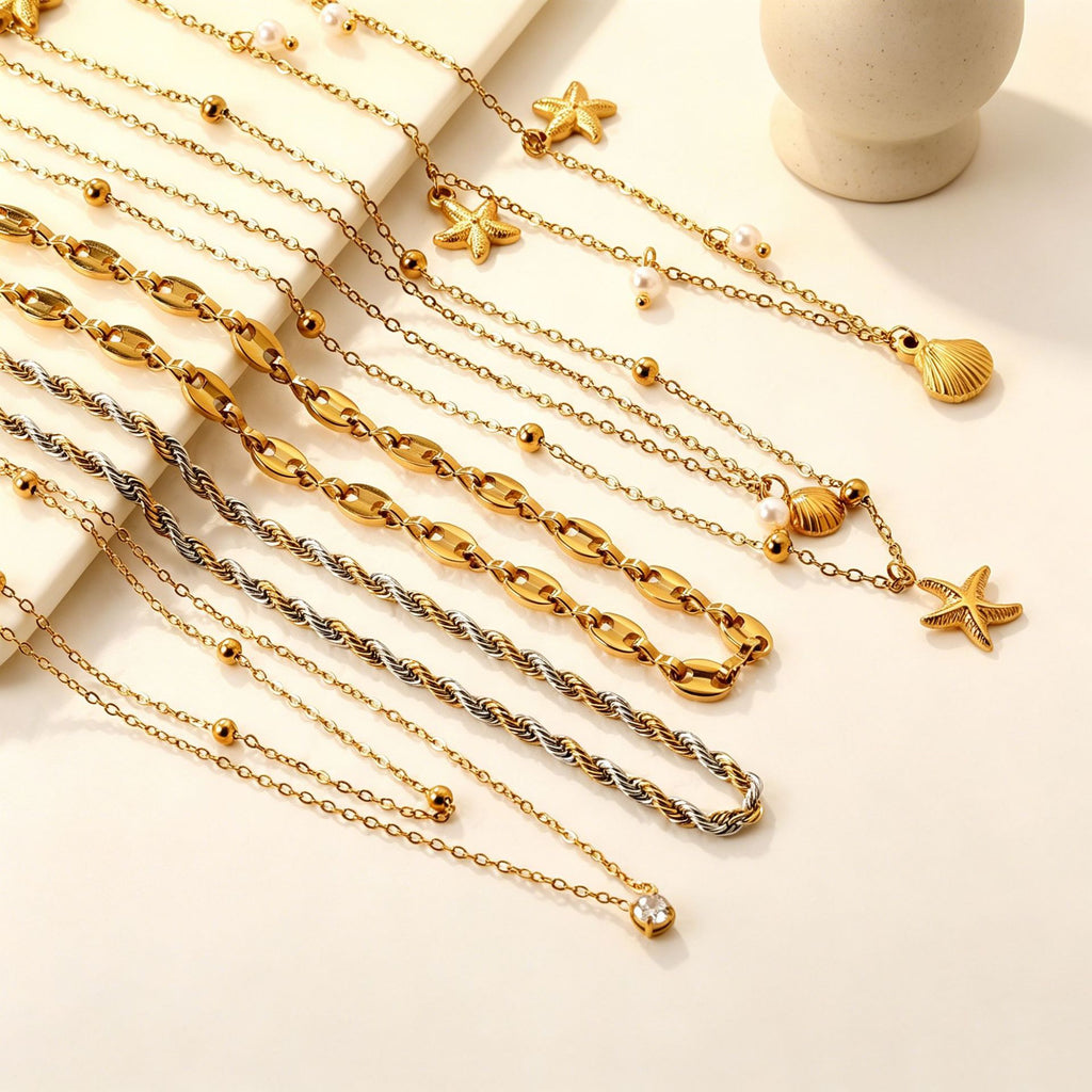 Damen Halskette mit maritimen Muscheln und Sternenanhängern Shop Nory