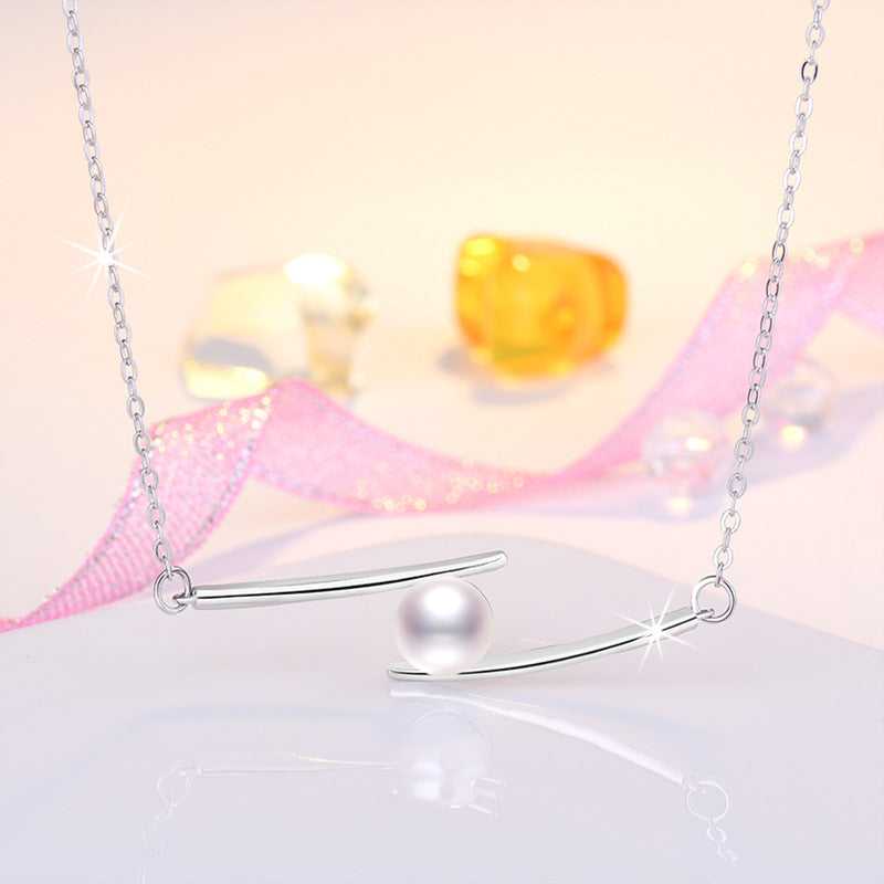 Damen Halskette mit modernem minimalistischen Design und elegantem Perlenanhänger Shop Nory