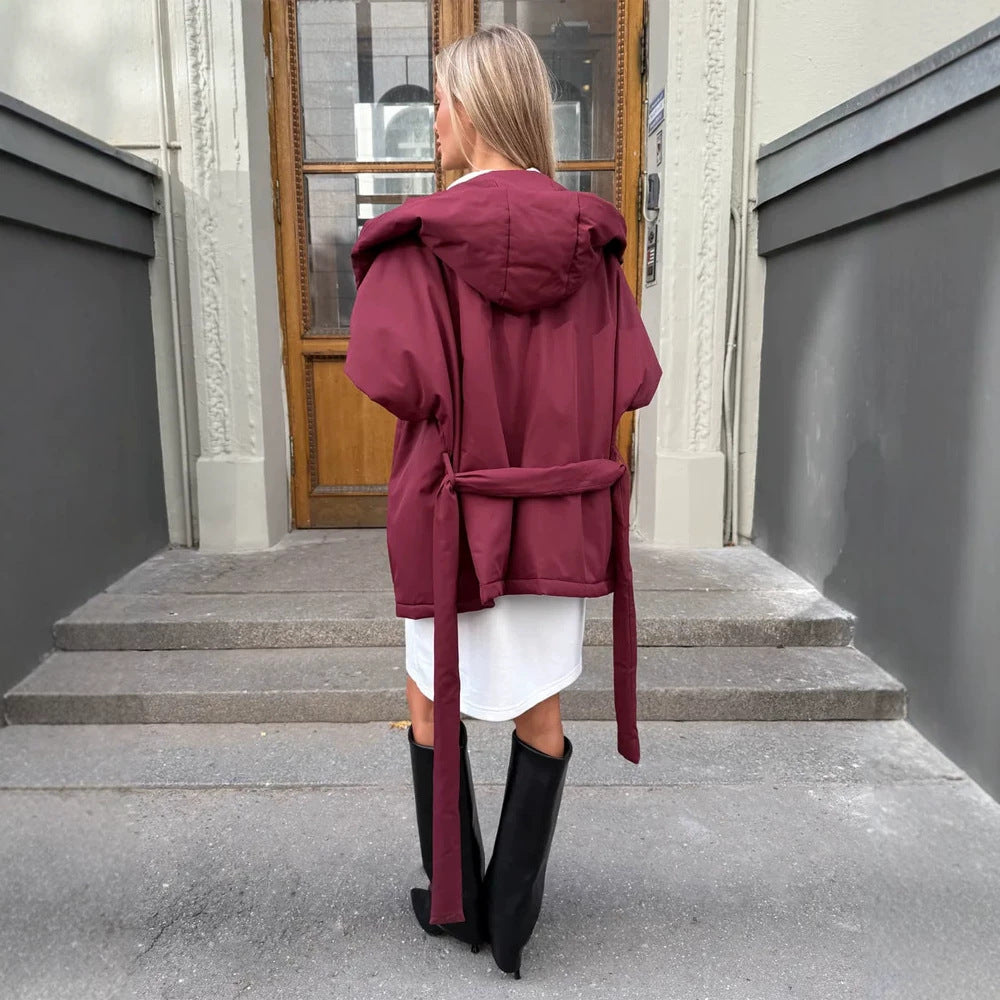 Damen Ärmellose gesteppte Kapuzenweste mit Taillenbindegürtel Shop Nory