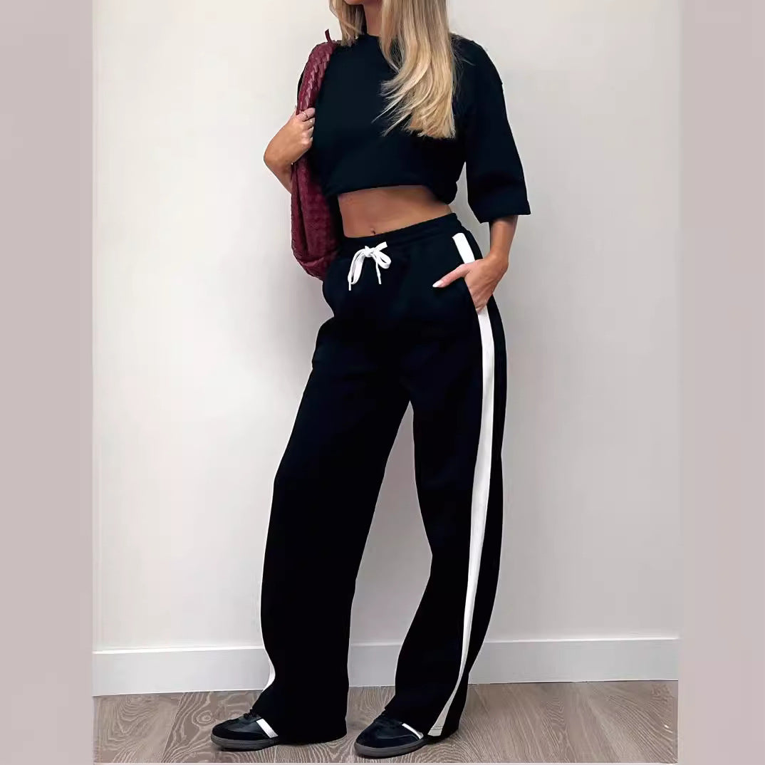 Damen weite High-Waist Jogginghose mit seitlichem Kontrast-Streifen und Taschen Shop Nory