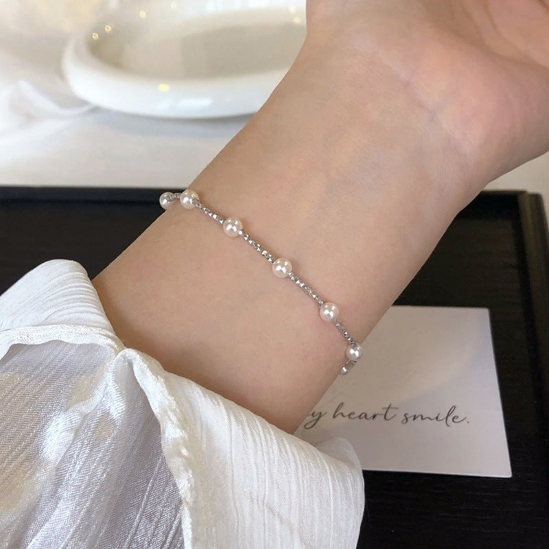 Damen Perlenarmband mit funkelnden Zirkonia Shop Nory