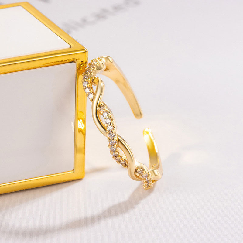 Damenring im eleganten Knoten-Design mit funkelnden Zirkonia-Steinen Shop Nory