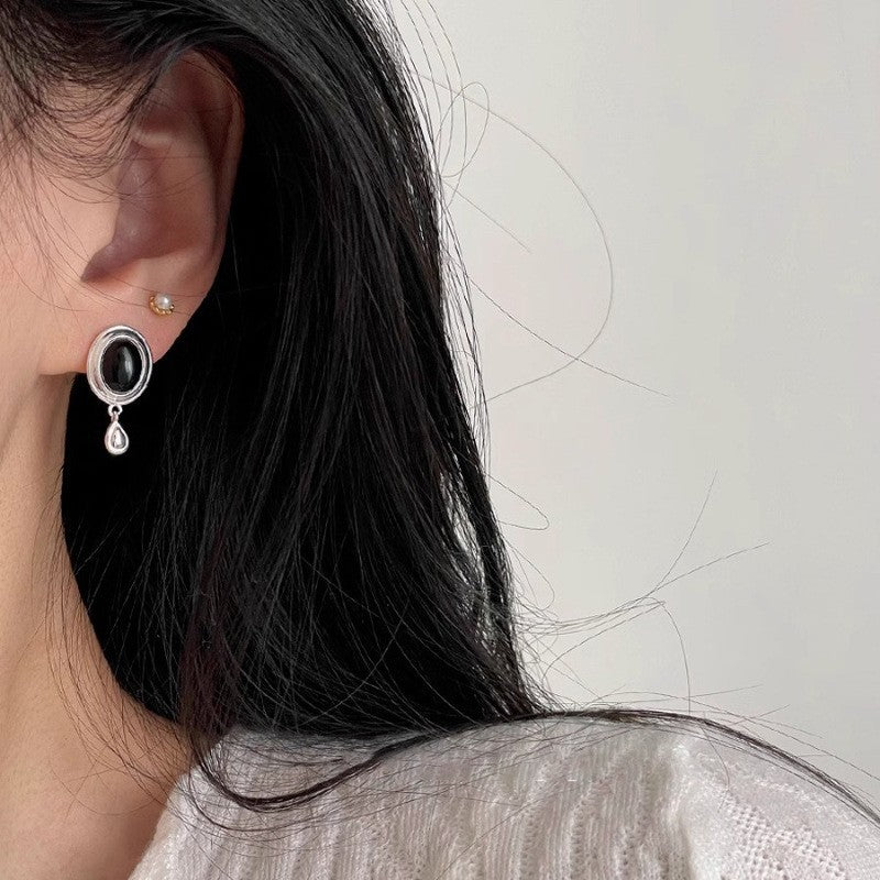 Damen Ohrringe mit elegantem Tropfen-Design und schimmerndem Onyx Shop Nory